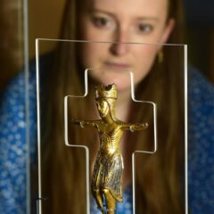 Adult looks at 'St Mary's figure of Christ', found at the site of the Yorkshire Museum.